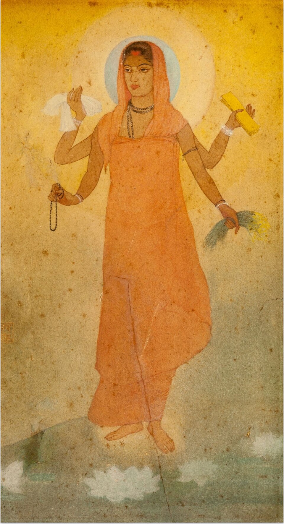 A standing four-armed figure in saffron robes in Abanindranath Tagore’s Bharat Mata.
